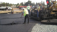 An opened-graded hot mix asphalt surface is constructed on the aggregate base. Note how the aggregate in the base is larger and more loosely compacted than a traditional base.