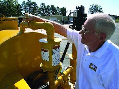 Open the recirculating valve to release pressure in the system and to allow material to recirculate. Leave this valve open throughout the winter.