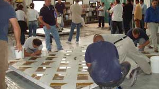 Students who attended Bob Harris's decorative concrete class at Ideal Works in Italy had hands-on experience with staining and design.