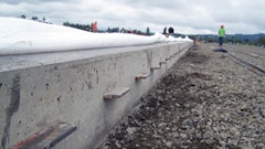Steel plate dowels carry loads across a construction joint, maintain vertical alignment between adjacent slabs and allow concrete shrinkage both perpendicular and parallel to the joint.