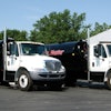 Two custom-built 2,250-gal. sealcoating rigs installed in new International 4300 trucks each feature SealMaster's Pro Air series of spray systems, cab-operated spray bars, and 50-gal. water systems.