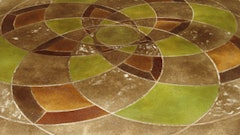 The texture you can achieve by acid staining a sweat finish concrete surface.