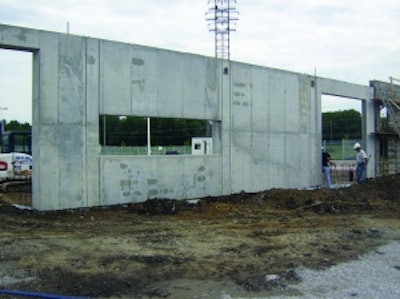 ABI Corp. used Western Form's Flagship G forms for the architectural facade of a building at an impound lot in Kansas City, Mo. The forms have gaskets which reduce concrete seepage at the seams to allow for a better finish. Here you see a 14-foot-8-inch-long window that challenged ABI Corp.'s traditional concrete pumping methods.