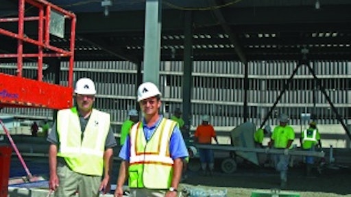 Paul Albanelli, left, and Wayne Albanelli, right, run Albanelli Cement Contractors in Livonia, Mich. The current economy has driven the commercial building contractors to look beyond their usual focus to secure jobs in renovation, municipal projects and DOT-type jobs.