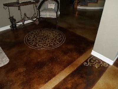 Jared Denham, owner of Full Circle Concrete Design, used acid stain and Modello stencils on the floor of the home's main level.