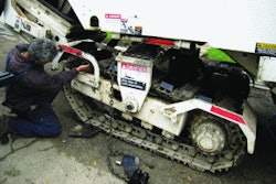 Bolt-on polyurethane track pads that mount over the triple grousers - such as these from BLS Enterprises - can save a lot of labor.