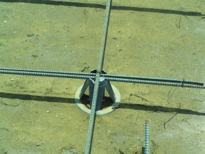 Unrestricted crack width growth leads to spalled edges along out-of-joint cracks when exposed to wheeled traffic, especially hard-wheeled lift trucks.
