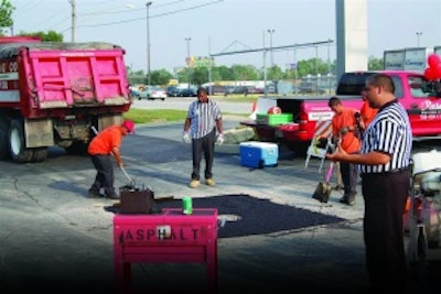 An open house event is a great opportunity to show off your facility, equipment, and crew. Plus, as at this Rose Paving open house, you can have an employee (right) explain what's happening as a crew demonstrates a repair.