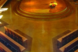The 11,000-square-foot polished concrete floor at St. Francis of Assisi Catholic Church has an integrally colored floor with two-toned dye accents. The main floor was polished to 800 grit while the altar and stairs were polished to 1,500 grit. The contractor used a lithium silicate densifier, which hardens a floor and closes its pores to give the surface greater resistance against stains and abrasion.