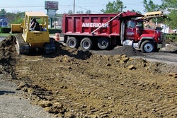 Each crew in American Asphalt Company's paving division has a specific responsibility whether it be grading, paving, or other essential tasks on the job.