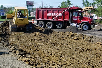 Each crew in American Asphalt Company's paving division has a specific responsibility whether it be grading, paving, or other essential tasks on the job.