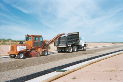 Southwest Surfacing uses the Broce MK-1 transfer broom to pick up and recycle aggregate that does not stick to the liquid asphalt during a chip seal. This extra aggregate can then be reused for other chip seals.