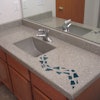 Nick Coello of Concrete Interiors created this 6-foot by 26-inch concrete bathroom countertop in one, seamless, precast piece.