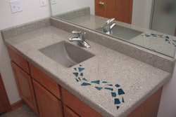 Nick Coello of Concrete Interiors created this 6-foot by 26-inch concrete bathroom countertop in one, seamless, precast piece.
