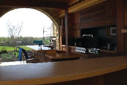 Concrete Jungle created multiple concrete countertops for an outdoor kitchen, including an island and multi-level counters.