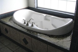 The shower and tub surround, which was somewhere between 400 and 700 square feet of work, took Hugh Miller about three days to complete.