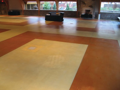 Color Surfaces used ColorJuice to color an outdoor, covered concrete slab to match the color of the Downstream Casino building.