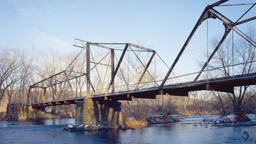 Coverts Crossing bridge as it looked before thieves dismantled and carried it off in late September.