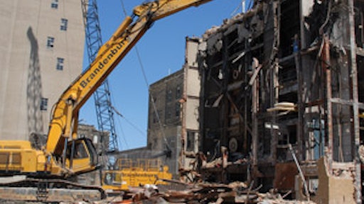 Brandenburg Industrial uses a high-reach excavator with a multi-processor attachment to deconstruct the Pabst Brewery in Milwaukee, WI.