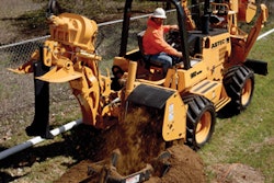 The proper attachments can turn a tractor into an efficient do-it-all utility installation tool.