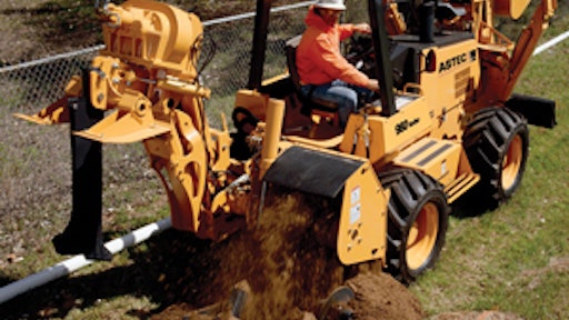 The proper attachments can turn a tractor into an efficient do-it-all utility installation tool.