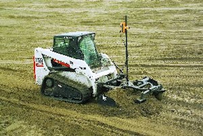 Most box blade attachments, such as the one mounted to this Bobcat T180, are equipped with laser grade control systems because they are less expensive than a 3D solution and provide a rapid return on investment.
