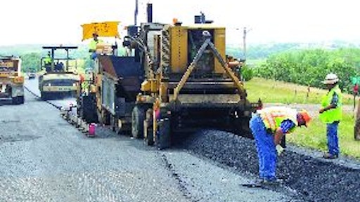 The project consisted of 6,000 tons of conventional hot mix and 5,570 tons of warm mix. The temperature of the mix was monitored to determine the rolling pattern required to achieve density for both hot and warm mixes.