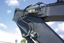 Always be careful about hose line routing. Note how the stick hoses on this HKX auxiliary kit follow factory lines to reduce wear.