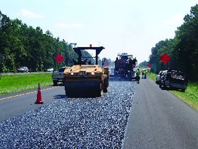 The compaction effort should start immediately after the ultrathin bonded wearing material is laid.