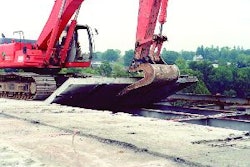 Sometimes there is no economical alternative to a specialty tool such as this concrete slab removal bucket.