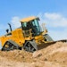 The John Deere 764 HSD defines a new machine form that fills a gap between finish dozers and motor graders.