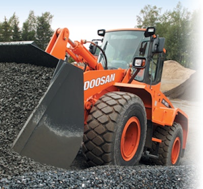 When approaching a pile, adjust your approach based on the type of material to be moved to minimize the impact on the machine.