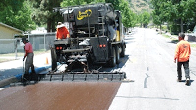 Using a VSS MacroPaver, crews placed 210,000 sq. yds. of RAP slurry seal over residential and small collector roads in eight days.