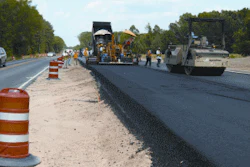 The project included approximately 115,000 cubic yards of earthwork, placement of graded aggregate base course, placement of over 77,000 tons of base, binder and surface asphalt.