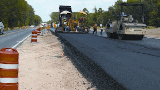 The project included approximately 115,000 cubic yards of earthwork, placement of graded aggregate base course, placement of over 77,000 tons of base, binder and surface asphalt.