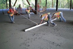The six, 10,000-square-foot concrete pours were made on an unshored metal deck cambered 2 in. over a 40-ft. span, making it difficult to achieve a flat surface.