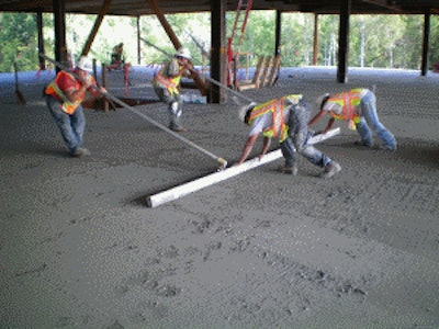 The six, 10,000-square-foot concrete pours were made on an unshored metal deck cambered 2 in. over a 40-ft. span, making it difficult to achieve a flat surface.