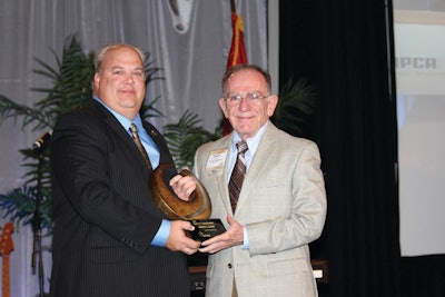 The 2011 recipient of the NPCA's most prestigious award - the Robert E. Yoakum award - Darryl Cloud receives the award at the annual convention.