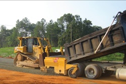 With the base-spreader attachment, Prince Contracting has increased daily road spread to 3,400 tons of base material and 3,200 linear feet of graded and compacted base.