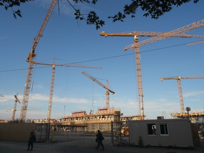 The new University of Economics and Business campus construction project in Vienna involves 17 tower cranes working on a 10-hectare site.