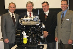 Presiding over Kohler's KDI Series unveiling are, from left, Dick Fotsch, group president - global power, Tom Cromwell, president - engine business, Bob Leffel, vice president - diesel engines North America, and Jeff Wilke, associate product manager.