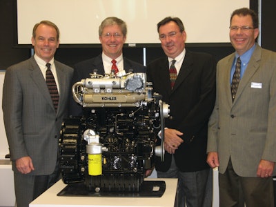 Presiding over Kohler's KDI Series unveiling are, from left, Dick Fotsch, group president - global power, Tom Cromwell, president - engine business, Bob Leffel, vice president - diesel engines North America, and Jeff Wilke, associate product manager.
