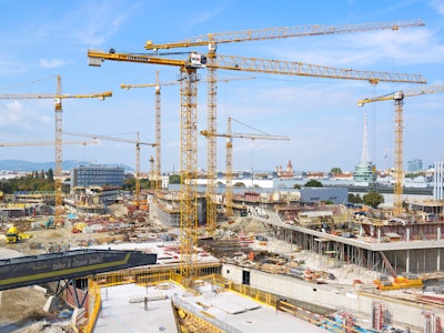 At peak operating times, up to 17 tower cranes are in use simultaneously throughout the Campus WU in Vienna, Austria.