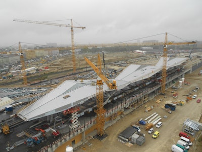 The main eye-catcher for the new main station is the folded, diamond-shape, translucent roof, which spans five island platforms and 10 tracks.