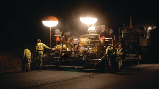 Gap-graded asphalt rubber mix is placed 1 1/4-in-chdeep at a temperature of 240 deg F at the screed.