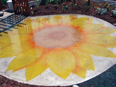 Benjamin McCarthy used a photograph to help create a 9-ft.-diameter concrete sunflower for a playground.