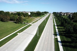 Concrete's high albedo, or solar reflectance, can reduce the amount of energy needed for artificial roadway illumination during nighttime and the amount of energy needed to cool urban environments associated with the urban heat island effect.