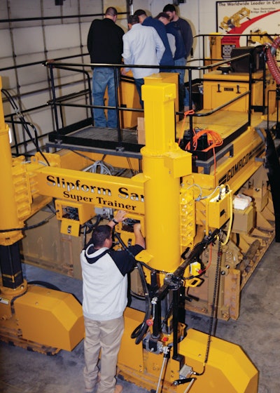 GOMACO University students gain hands-on training with Slipform Sam, the University's Super Trainer, during a paving class held last year.