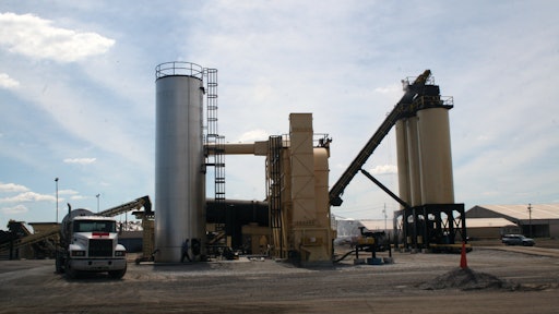 The plant chosen for the Grand River site was a dual-drum MileMaker 350 with three 200-ton silos, a pair of vertically mounted AC tanks and a 60,000-cfm baghouse.