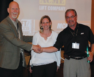 Guy Ramsey and Katie Parrish of Maximum Capacity Media present the LLEAP award to JLG Product Champion Bill Dovey at the Lift & Access Showcase in Scottsdale, AZ.
